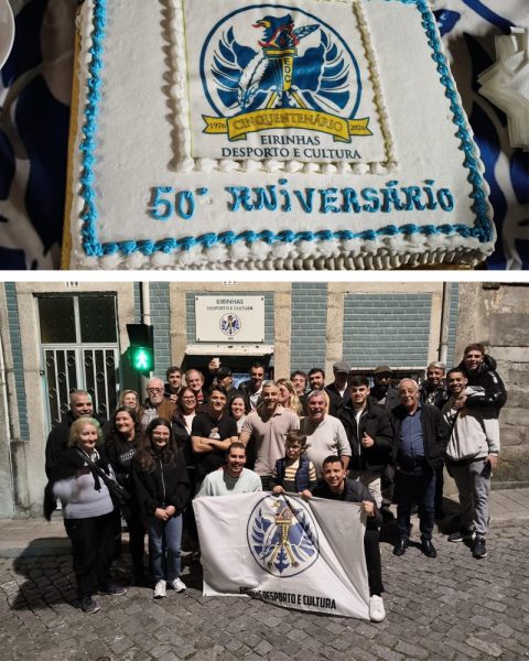 Celebração dos 50 anos do Eirinhas Desporto e Cultura com bolo e momento simbólico, com presença de representantes da Junta de Freguesia do Bonfim.