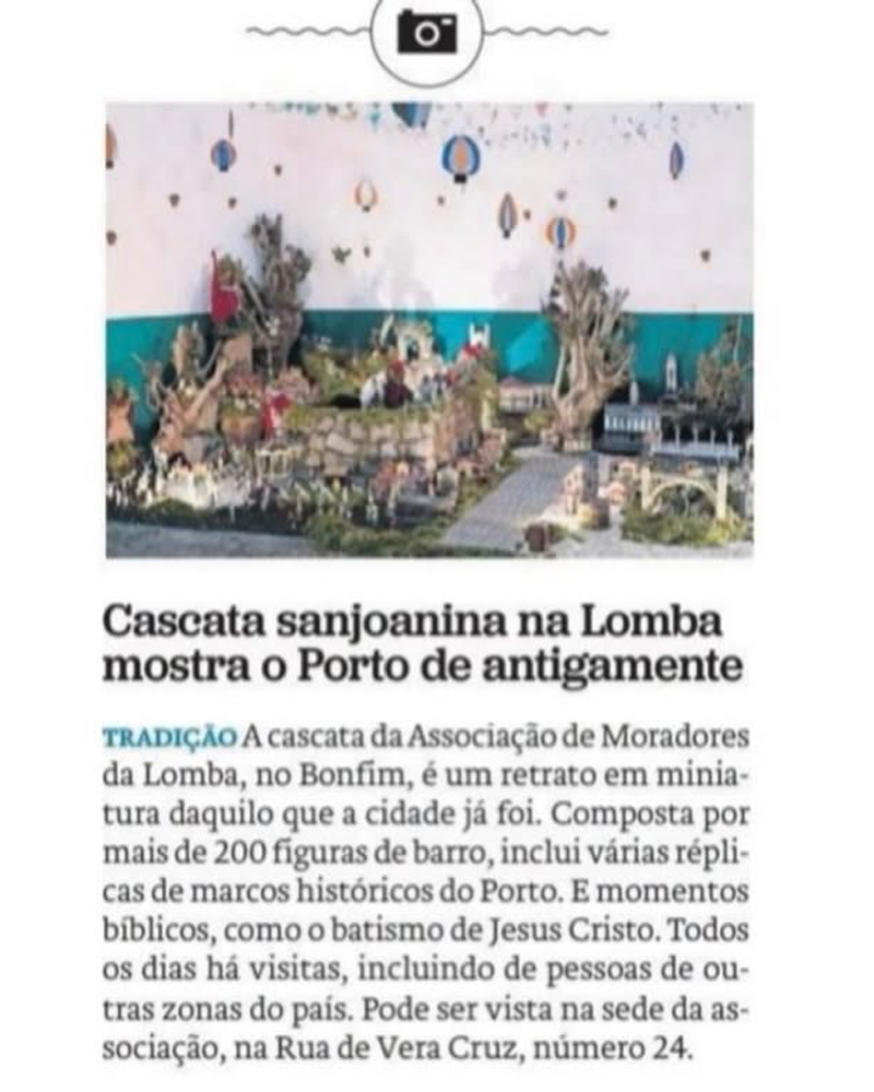 Cascata tradicional da Associação de Moradores da Lomba, composta por figuras típicas e cenários populares, exposta na sede da associação e destacada pelo Jornal de Notícias.